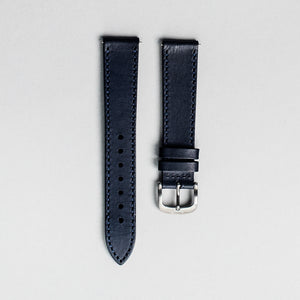 The blue veg tan Italian leather strap with brushed buckle. 18mm