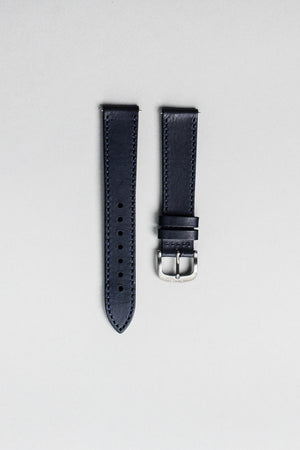 The blue veg tan Italian leather strap with brushed buckle. 18mm