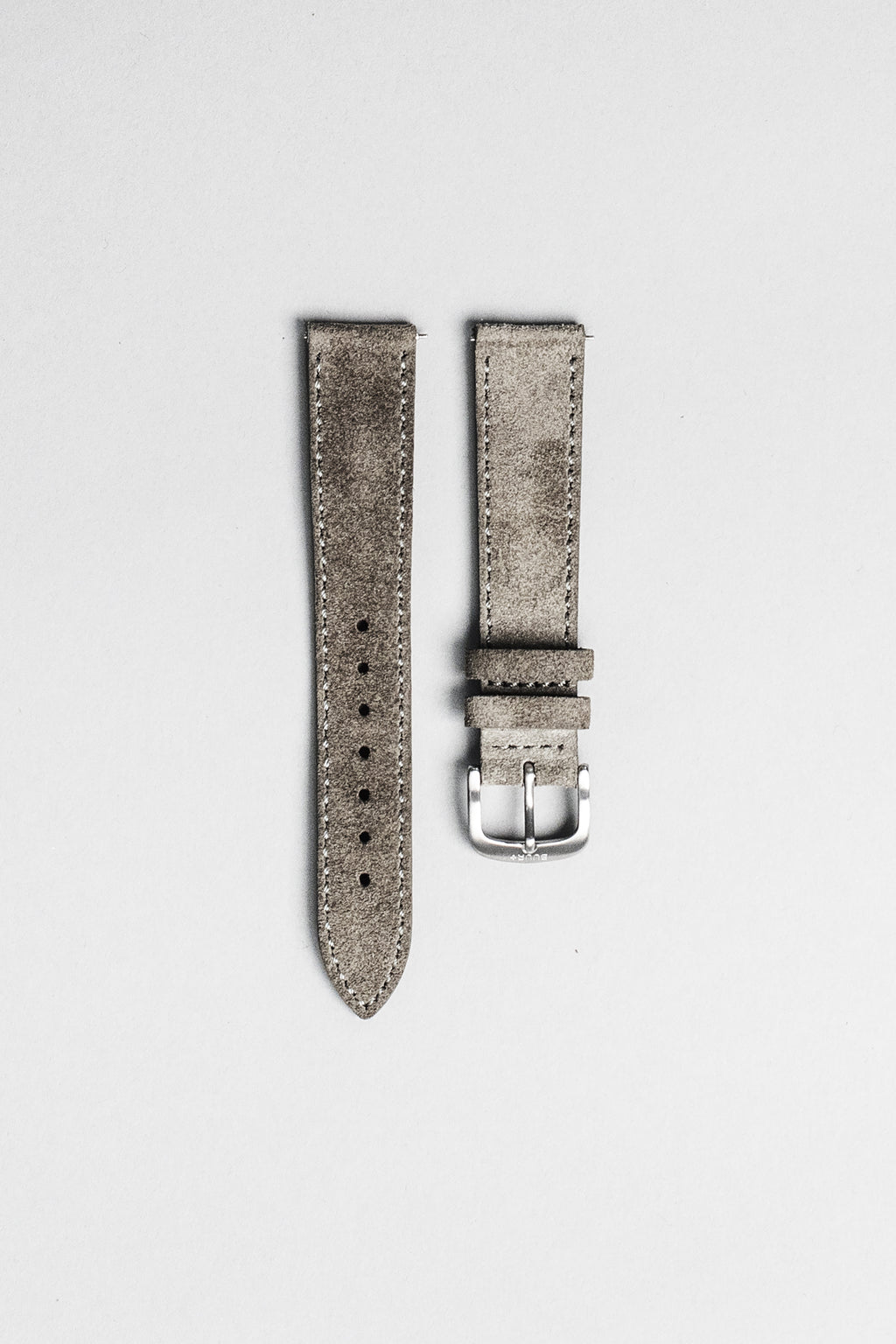 The grey Italian suede strap with brushed buckle. 18mm